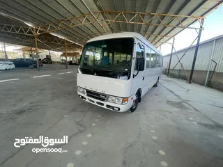  1 باص متسوبيشي فوسو حره غير مجمرك 26 راكب ماتور كهرباء