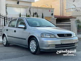  3 ‎أوبل استرا موديل 2001  وارد الوكالة ومالك واحد فقط من الشركة عداد 100الف كيلو فقط