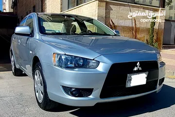  2 ميتسوبيشي لانسر 2014 بحال الوكالة