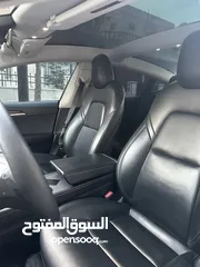  18 تسلا موديل 3 لون أبيض لؤلؤي 2022 Tesla model 3 . 2022