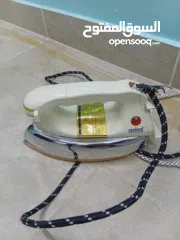  5 مكواة ملابس 2 جيده معه طابعه