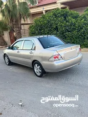  16 ميتسوبيشي لانسر فحص كامل 1600اصلي ولا ملاحظه موديل 2009 اوتوماتيك بوضع الشركه وارد الكويت مالك واحد
