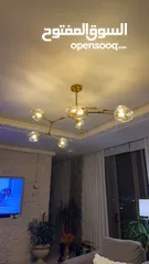  1 ثريا مودرن ذهبية بثمان رؤوس زجاج – من محل MECASA Khalda