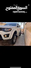  2 بكم متسوبيشي L200 2013 ماتور 2500 تيربو بحالة الوكالة تب نظافة البكم أجمل من الصور
