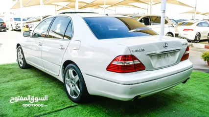  14 لكزس LS430 وارد 1/2 الترا موديل 2006 لون أبيض فتحة جلد رنجات خشب مرايا كهرباء بحالة ممتازة