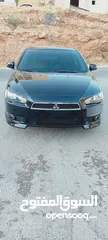  28 متسوبيشي لانسر فراشة موديل 2015 فحص مرفق مع الصور بحالة الوكاااااالة  ماشية 49 الف km  أصلي