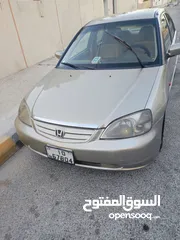  6 هوندا سيفيك لون ذهبي موديل 2003 جير عادي  إقتصادية جدا تقطع بالتنكة 280 كيلو بور ستيرنح سنتر لوك