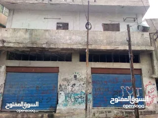  9 ارض تجاري مع طابقين مع مخزنين-الزرقاء-الجبل الابيض (كلو مفروز) قوشان مستقل-كاش فقط لا يتوفر تقسيط...