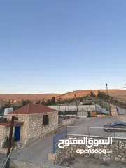  27 فرصة استثمارية لا تعوض ارض 14 دونم مع ملعب قدم خماسي باعلى المواصفات ، مرافق وصاله كبيره وتراس خارجي