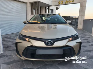  1 تويوتا كورولا 2021 لون شمباني بنزين اصلي ماتور cc1600 فحص كامل جمرك حديث