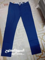  15 شروات ملابس رجالي بنطلون جينز وكتان وقميص وشرت البضاعه جديد البضاعه صنع تركي وصيني العدد 610