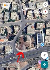  1 أرض للبيع على شارعين في بسمان – واجهة شمالية شرقية وجنوبية شرقية -بجانب محطة راية الأردن وكريم مول