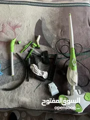  1 مكنسة تشتغل على الماء (التنظيف بالبخار) شغالة للبيع مع معداتها
