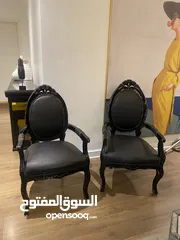  1 2 black arm chairs