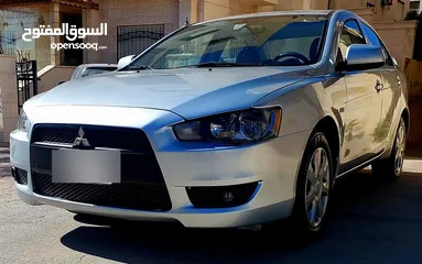  3 ميتسوبيشي لانسر 2014 بحال الوكالة