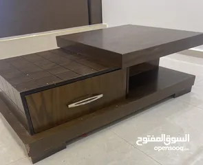  1 كنب لف جلوس  وطاولة وسط مستعمل بحالة جيدة جدا