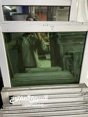  1 شبابيك الامنيوم لون ابيض زجاج اخضر
