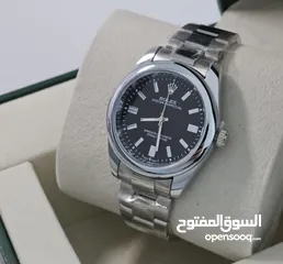  9 رولكس رجالي مرفق علبه وكيس رولكس وكفاله سنه