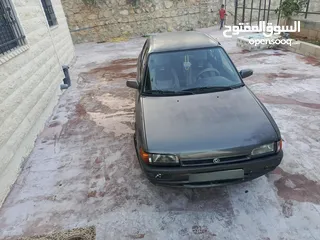  5 مازدا 323 1992