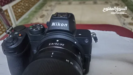  6 كاميرا نيكون Z5 مع العدسة الوكالة + جهاز لاقط الفيديو لاسلكي