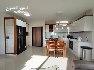  10 شقة بإطلالة عالية في قلب عين منجد – فرصة لا تعوّض