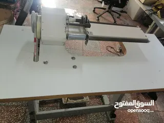  1 ماكنه قص ولف القماش