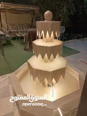  6 نوافير حجرية ابيض قطر 1متر البحرة  مع حوضين بالوسط مع الوصلات شامل التركيب والتشغيل