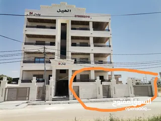 22 شقه طابق ارضي مدخل خاص وكراج خاص وساحه للبيع على شارع البترا شرق اربد مول قراند وكازيه الرجوب
