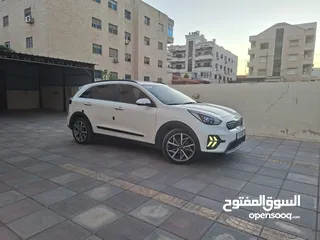  10 كيا نيرو 2021 جمرك جديد وارد كوري ممشي 32  الف فحص كامل جنطات تورنج