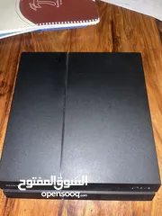  1 PlayStation 4 with a controller