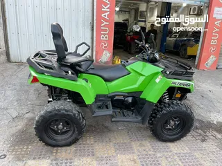  1 دراجه رباعيه الدفع نوع ARCTIC CAT