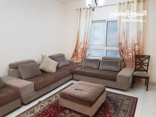  2 محمود سعد )غرفة وصالة للايجار الشهري في الشارقة التعاون بفرش فندقي ثاني ساكن بتشطيب ممتاز