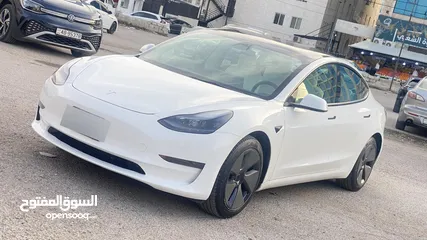  3 تيسلا موديل 2023 tesla model 3 فحص كامل اتوسكور A 2800 مميزة داخل ابيض