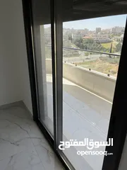  13 شقة طابق اخير مع روف/ مساحة 205م/ شفا بدران/ ترس واسع و مطل على شارعين/ صرف صحي واصل
