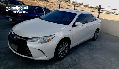  9 تويوتا كامري هايبرد موديل 2015 فحص كامل أعلى صنف بالاضافات XLE بحالة الوكالة.
