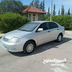  1 تويوتا كورولا 2003بيكومون بحاله ممتازه