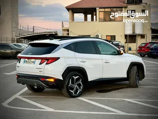  21 هونداي توسان/2022 Plug In فل الفل فتحة سقف بانوراما  4x4 ///271Hp   ( Haybrid) 1600cc