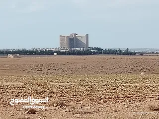  2 قطعة ارض للبيع مساحتها 5دونمات مفروزه قوشان مستقل خلف مستشفى الملك عبدالله وجامعة العلوم والتكنولوجا