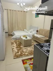  27 For rent in Ajman, studio in Al Yasmeen Towers, opposite Ajman City Centre, new furniture, easy exit