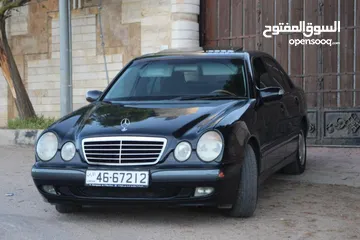  1 E200. 2002  قرش ونص 2002  رقم الهاتف بالوصف