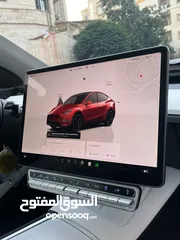  16 تيسلا Y 2022 performance لون خمري مميزة داخلي ابيض الاداء العالي دفع رباعي وبسعر مغري جداً جمرك جديد
