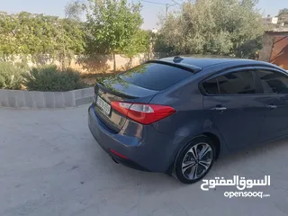  3 كيا سيراتو موديل 2014 ما شاء الله فول اضافات فتحة سقف حساس امامي خلفي شركة ليد امامي وخلفي سبويلرات