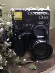  1 كاميره  نيكون السعر 600