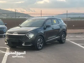  6 كايا سبورتاج /2022 فل بدون فتحة سقف  2x4 ///240Hp بنزين + كهرباء  ( Haybrid) 1600cc