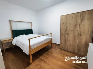  16 شقة جديدة مفروشة مع حديقة للإيجار – عين منجد  شارع إسكان المهندسين