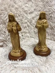  9 تماثيل خشب زيتون نحت يدوي احجام وأوزان مختلفة