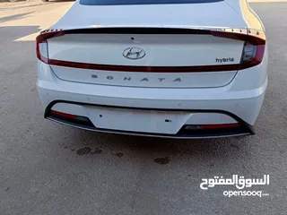  7 SONATA HYBRID 2020 ابيض لؤلؤي كوري  عداد 32 الف كيلو