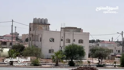  7 عمارة للبيع بالقرب من جامعة مؤتة