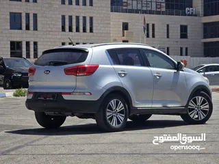  4 كيا سبورتاج ولا جرام بيوة 2014