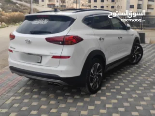  5 هونداي توسان فل الفل اضافات دهان شركة وعداد أصلي 70000كم فقططط رخصة وتأمين شامل للبيع بسعر مغري